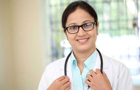Female doctor in hospital interior Team Member